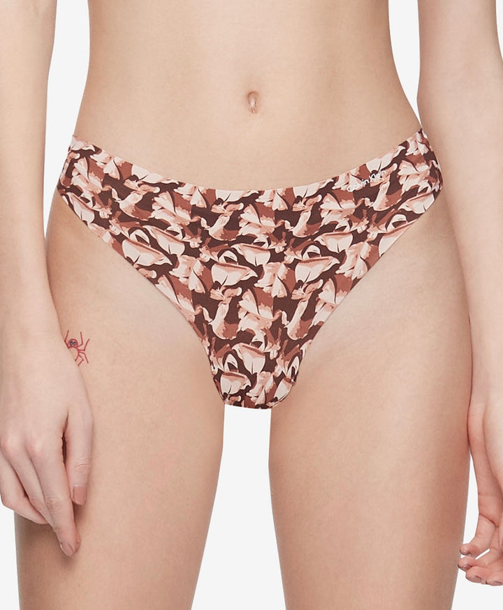 Calvin Klein Women's Invisibles Thong Underwear Left Behind Printumber Size XL